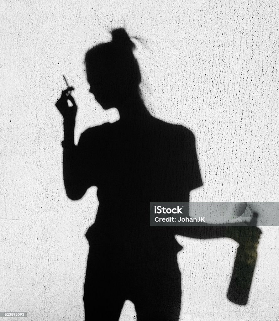 Shadow Of Sad Girl Smoking Around On Wall Background Stock Photo ...