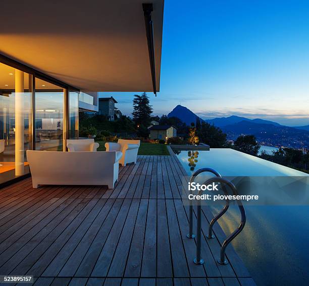 Modern House With Pool Stock Photo - Download Image Now - Porch, Illuminated, Luxury