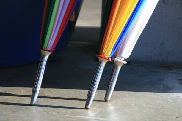 Detailed view of three colorful umbrellas