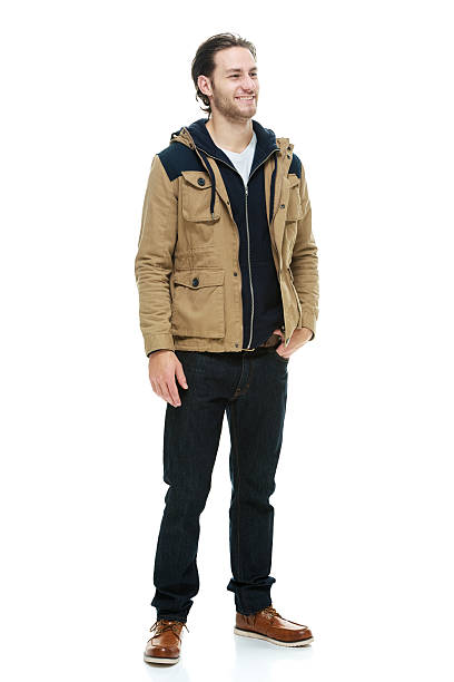 istock Smiling man in warm clothing & looking away 523896355