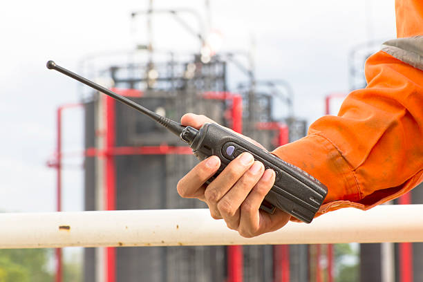 istock man with walkie talkie for outdoor 523896917