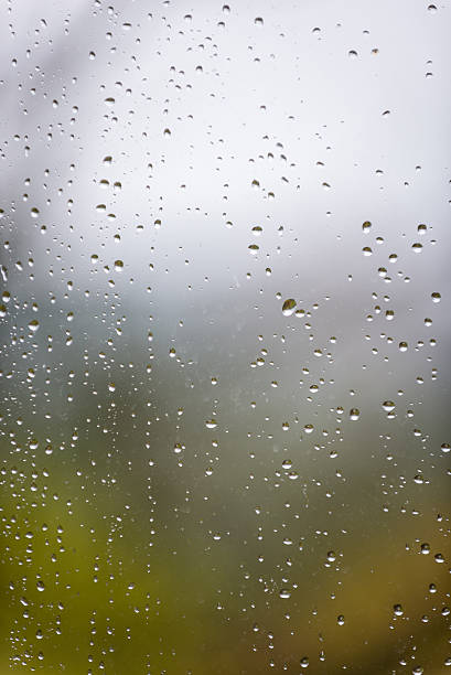 Water drops on glass - vertical. stock photo