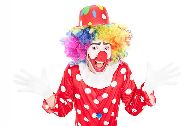 istock Happy male clown gesturing with hands 523898611