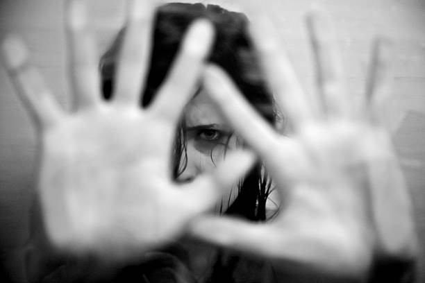 istock Woman scared about abuse and violence 523899333