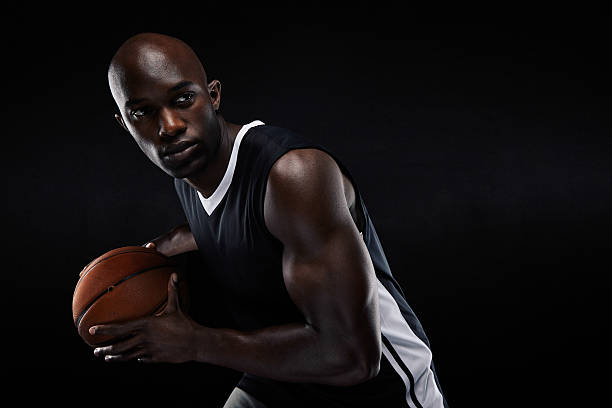 istock Young basketball player looking away 523899851