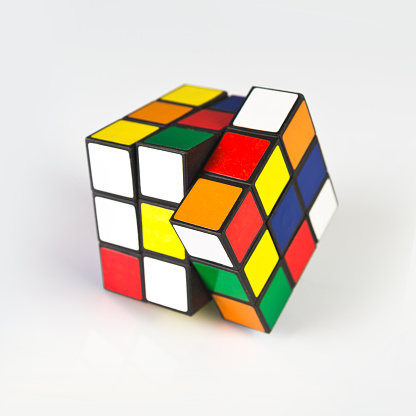 Novi Sad, Serbia - November 17, 2014: Rubik's Cube invented by a Hungarian architect Erno Rubik in 1974 is famous is 3 dimensional puzzle originally called Magic Cube.