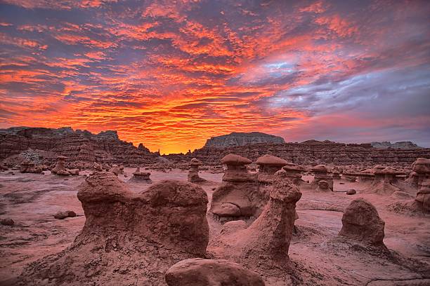 Goblin Valley Sunrise A sunrise over Goblin Valley State Park in Utah. goblin valley state park stock pictures, royalty-free photos & images