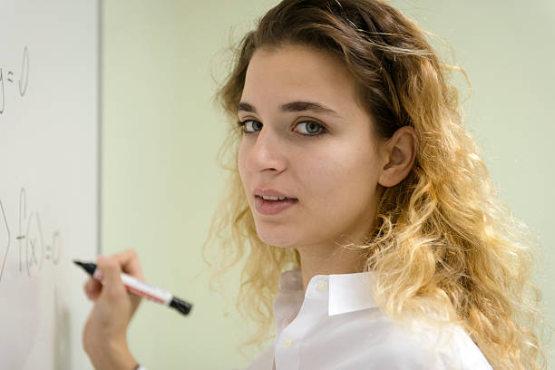 istock Blond Woman Doing Math at Secondary School, University inIstanbul, Turkey 523918879