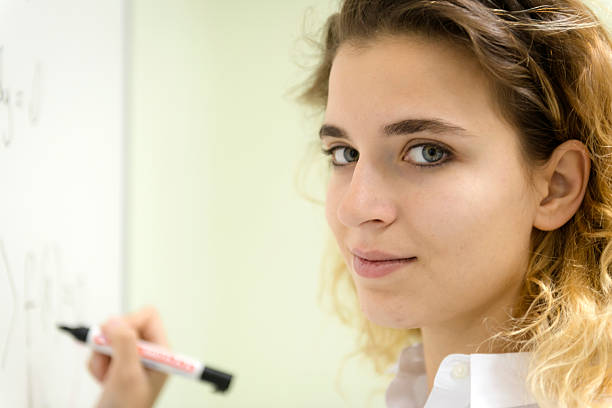 istock Blond Woman Doing Math at Secondary School, University inIstanbul, Turkey 523918893