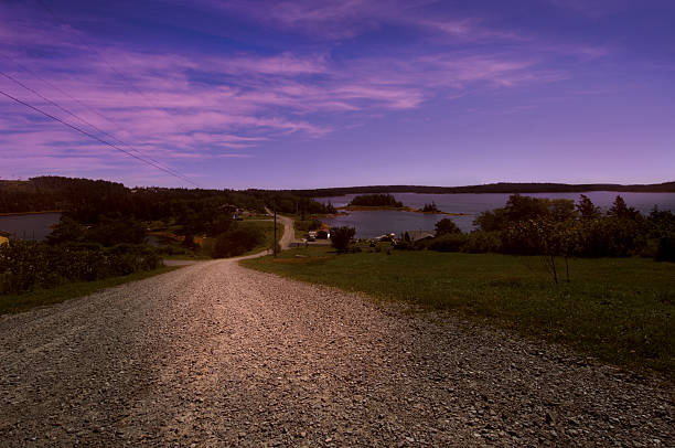 Road to the lake at dusk stock photo