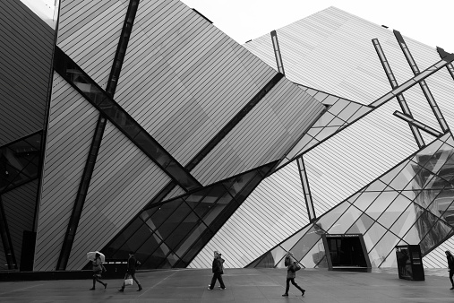 Toronto, Canada - November 13, 2014: The outside of the Royal Ontario Museum during the day. People can be seen outside