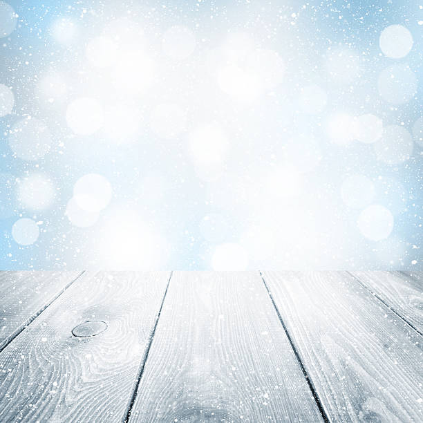 istock Christmas winter background with wooden table 523921619