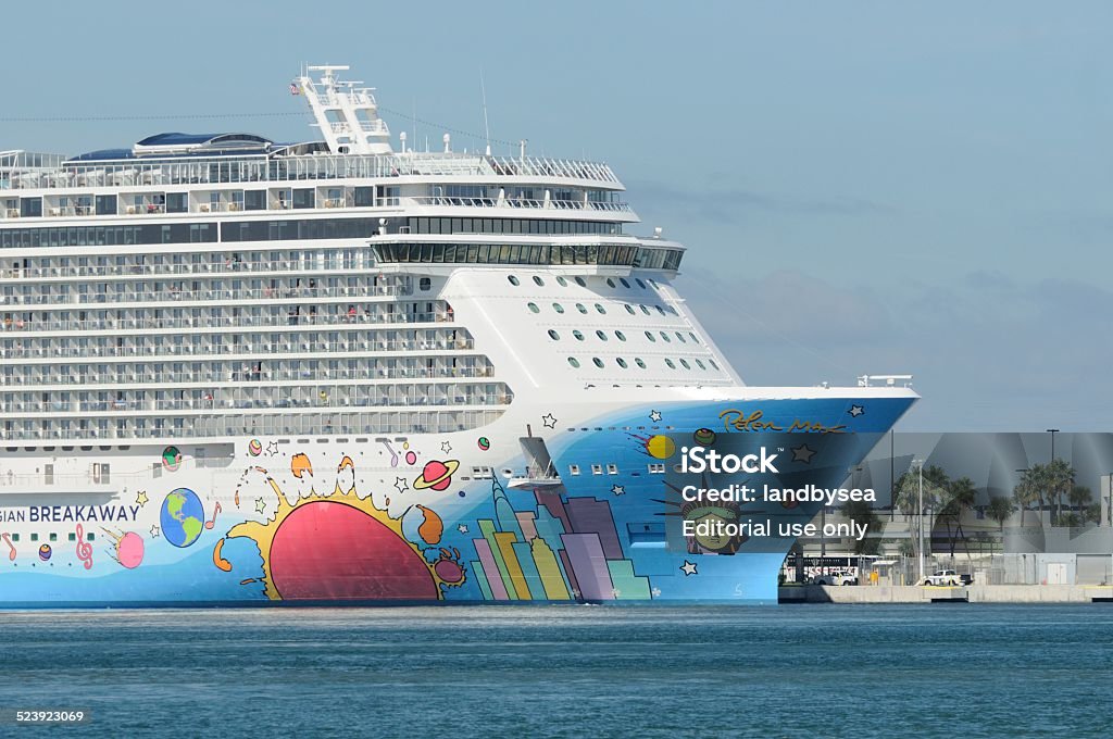 Norwegian Breakaway at Port Canaveral Port Canaveral, Florida, USA - November 11, 2014: The cruise ship Norwegian Breakaway at dock at Port Canaveral. The bow is painted with the head of Miss Liberty and the New York City Skyline is signed by Peter Max. Cape Canaveral Stock Photo