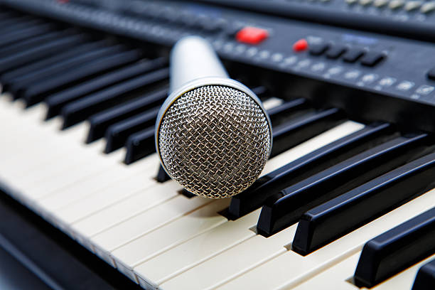istock The microphone lies on synthesizer keyboard 523923533