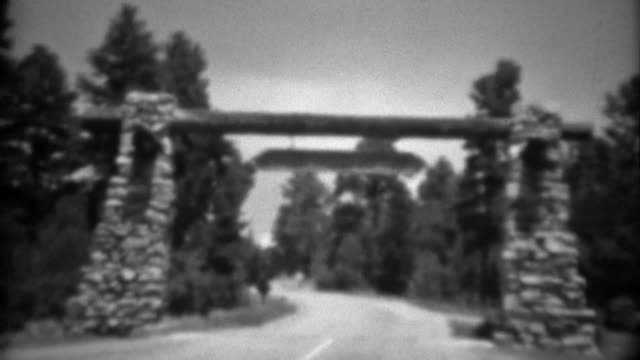 1937: Grand Canyon entrance visit sweeping pan tree perspective.
