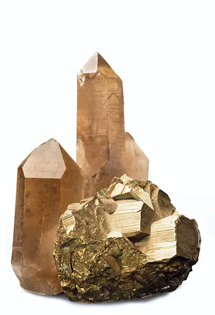 Natural crystals of smoky quartz and pyrites on a light background