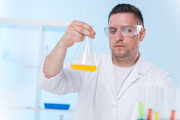 Researcher working with chemicals