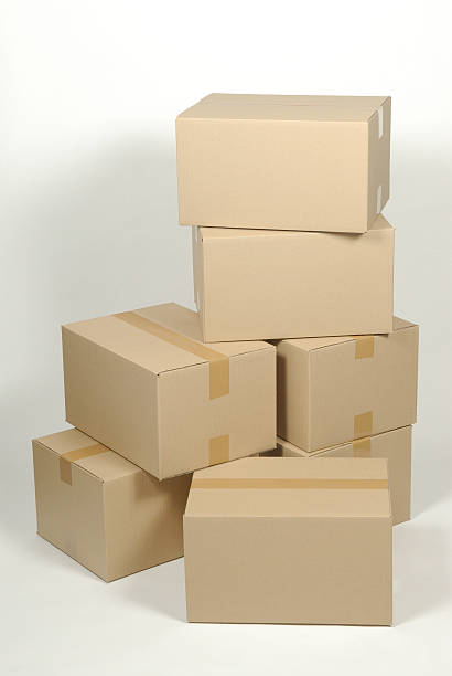 istock pile of cardboard box on white background 523967763
