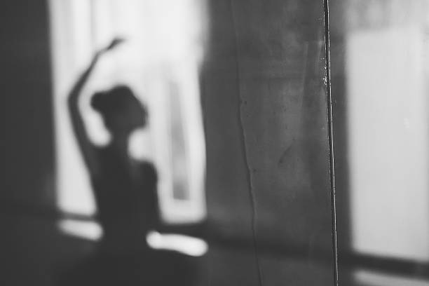 istock Ballerina  posing in front of the mirror 523970743