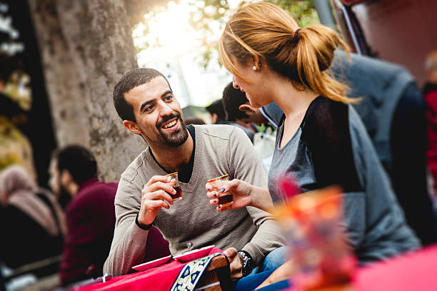 istock Happy friends drinking tea in a cafe 523970955