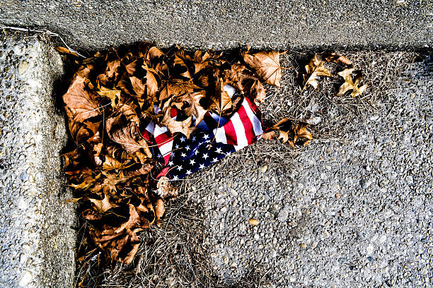 istock USA flag on the ground 523971113