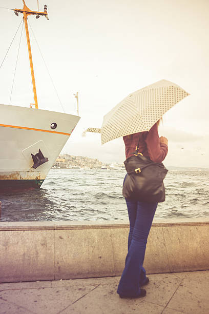 istock Woman Waiting For Ferry Boat On Boshorus 523996115