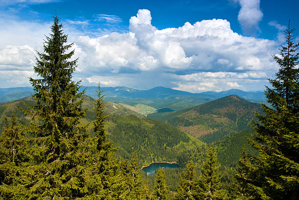 istock Landscape with clouds, mountains and blue sky. Carpathians, Ukra 523996403