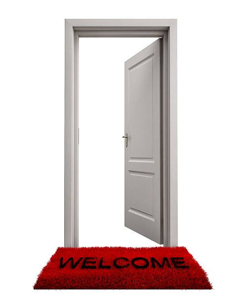 istock Open Door with Welcome Mat Isolated on White Background 523997231