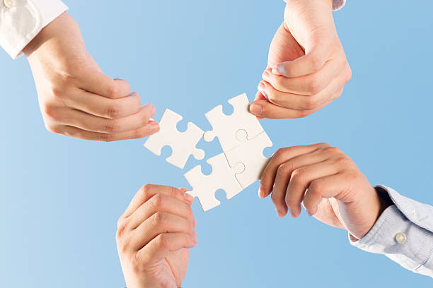 istock puzzle jigsaw and concept with sky background 523998217