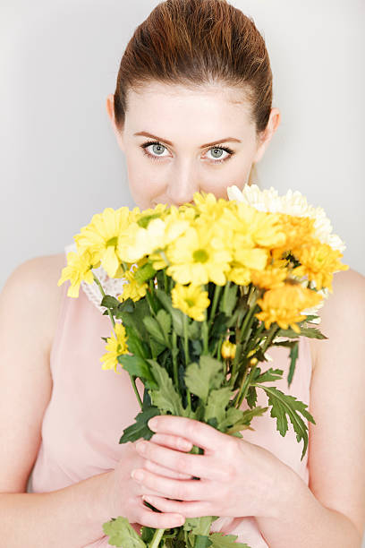 istock Woman with fresh flowers 523998833