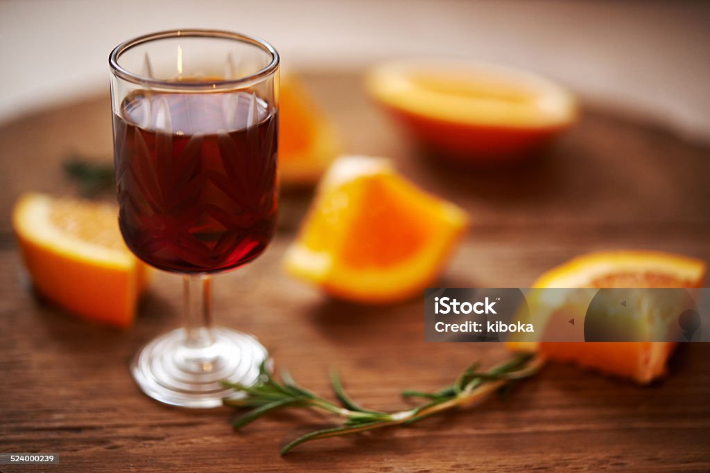 port wine glass ruby sweet wine and oranges on wooden background. shallow doff Port Wine Stock Photo