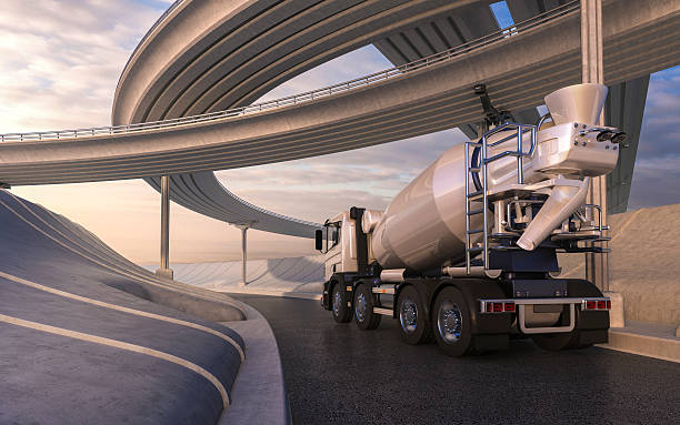 Cement mixer trucks on highway stock photo
