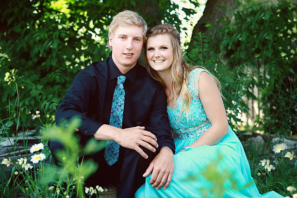 istock Teen Couple Smiling at the Camera 524014114