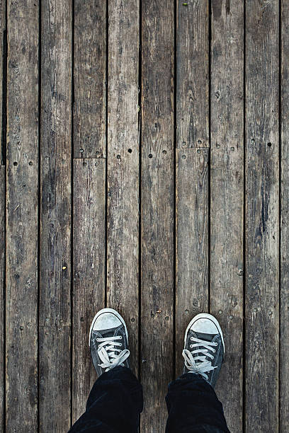 istock People standing on wooden floor 524014364