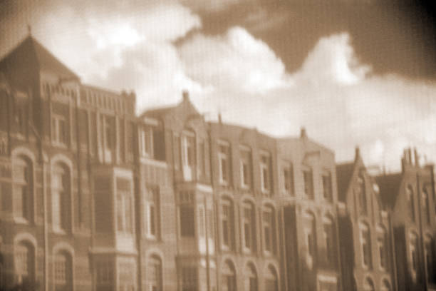 Old Amsterdam buildings made into apartments- sepia, bokeh,softened