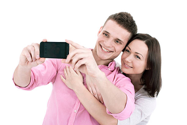 istock Attractive young couple taking a selfie together 524015330