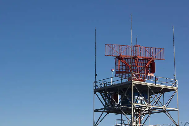 air-traffic control antenna with blue sky background