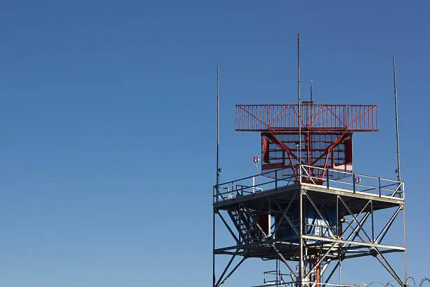 air-traffic control antenna with blue sky background