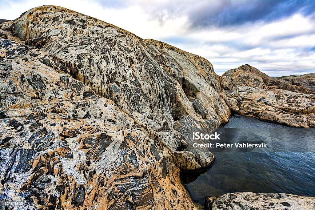 Amazing rock landscape at Ersdalen Hönö Sweden Amazing rock landscape at Ersdalen Hönö Sweden. The Swedish island Hönö, the island of sun and wind, is located in the west coast in Gothenburg archipelago just off the coast of mainland Sweden. The nature and landscapes of Hönö is unique with a special light and a wide range of different nature types. Beauty Stock Photo