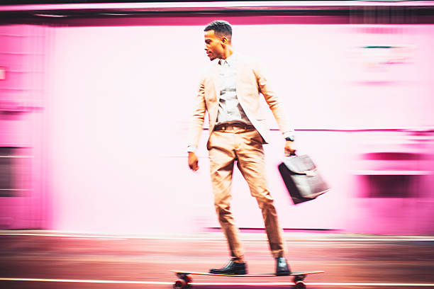 istock Young businessman skateboarding in offices 524017434