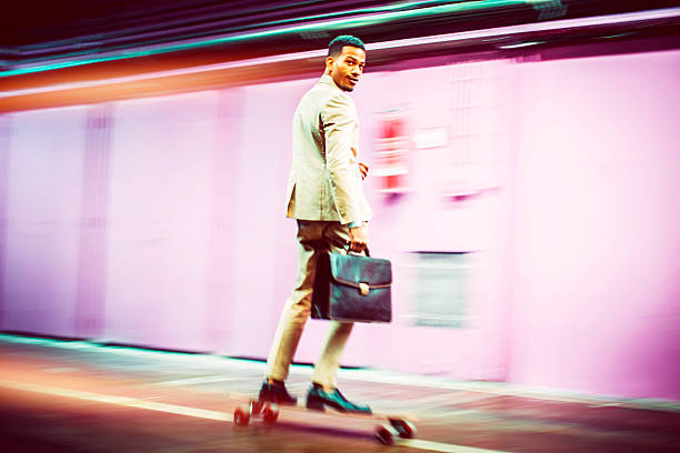 istock Young businessman skateboarding in offices 524017450