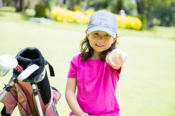 istock Little golf player at the field 524018088