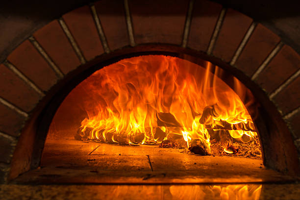 istock Fire wood burning in the oven 524019658