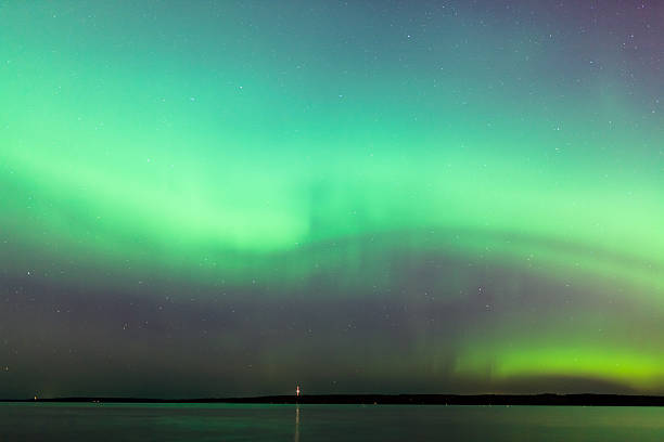 istock Northern lights over lake in finland 524020018