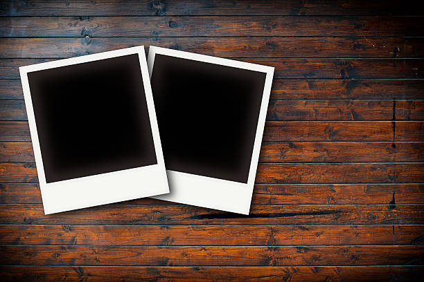 istock Photo frames on wooden board background texture 524022817