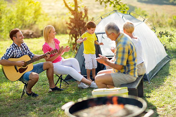 istock child singing with smiling family 524023602