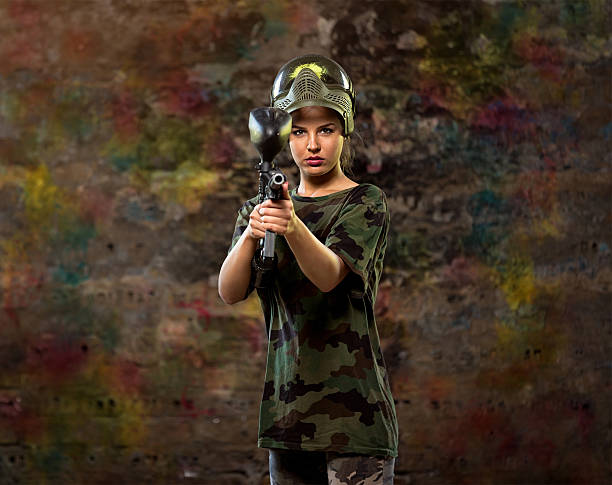 istock Female paintball player 524026002