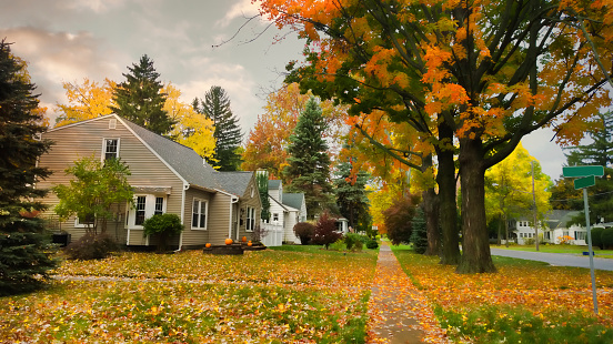 pretty village street in autumn