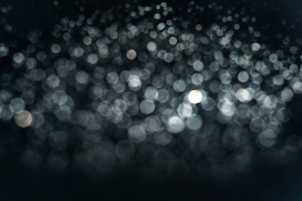 istock Abstract dark blur  bokeh lighting as modern black background 524027250