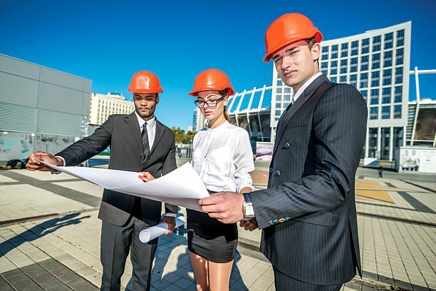 istock Chief architect. Three confident business architect in protectiv 524027443